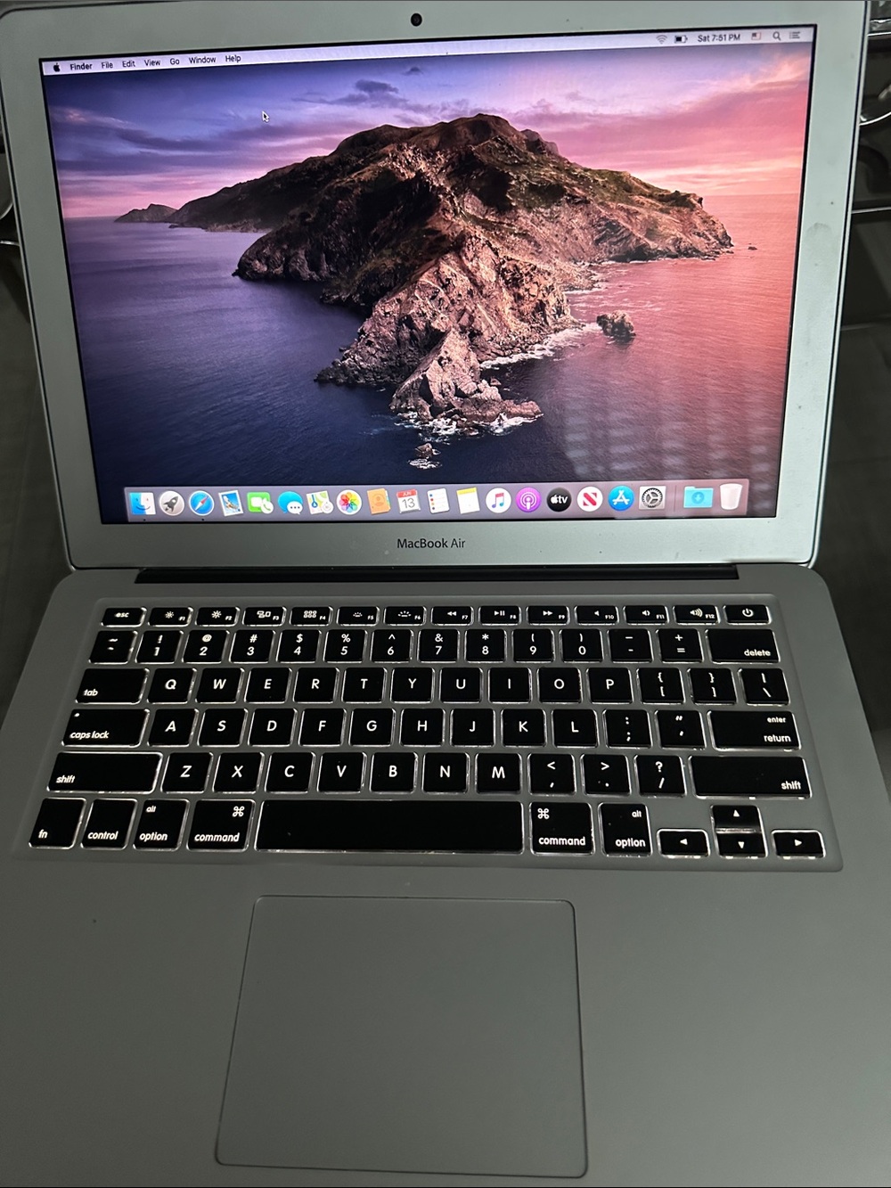 Apple Silver MacBook Laptop with Iconic Logo